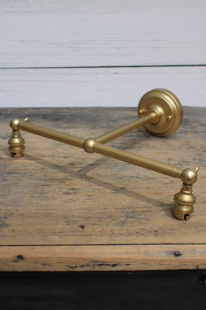 gold two arm wall sconce