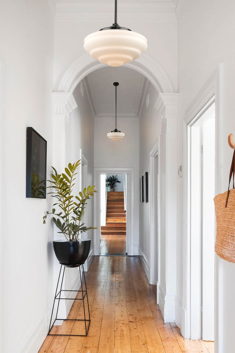 Rockabilly black pole pendant in hallway