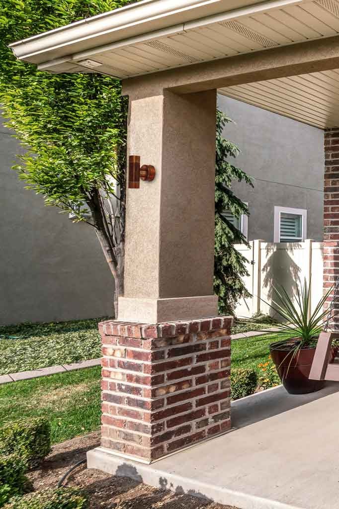 copper outdoor wall light in the entrance of a house