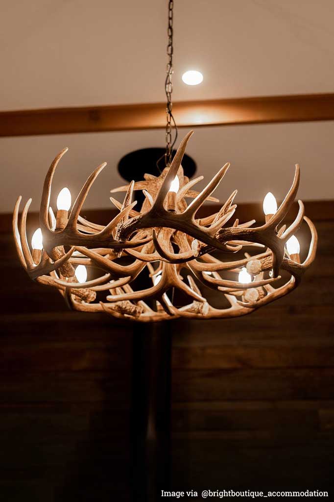 Close-up of detailing on large Roebuck chandelier.