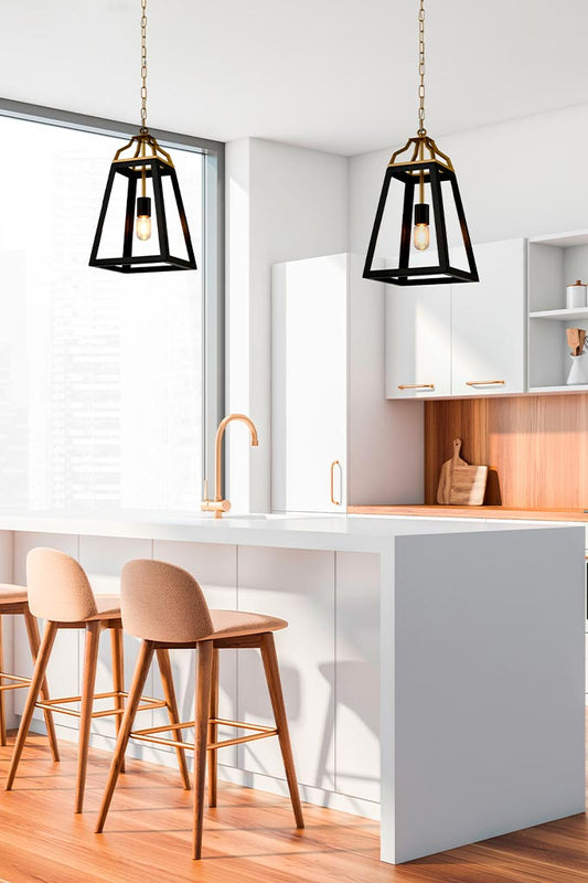 two black pendant lights over kitchen island