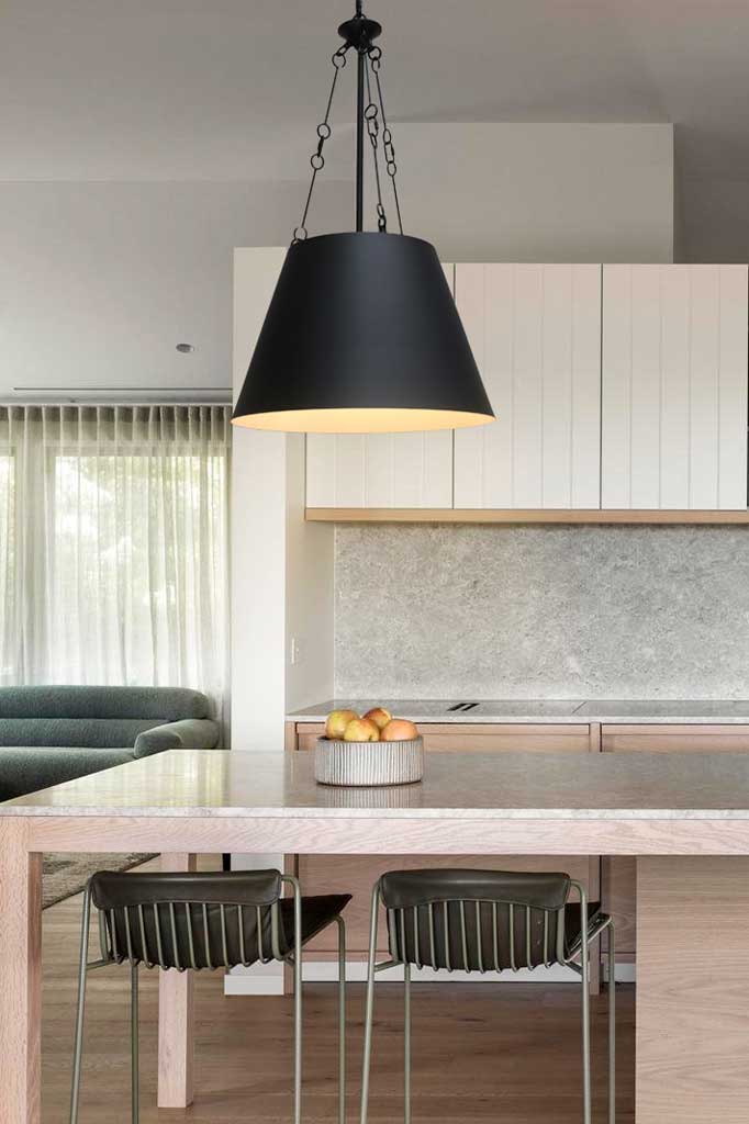 black pendant light over kitchen island