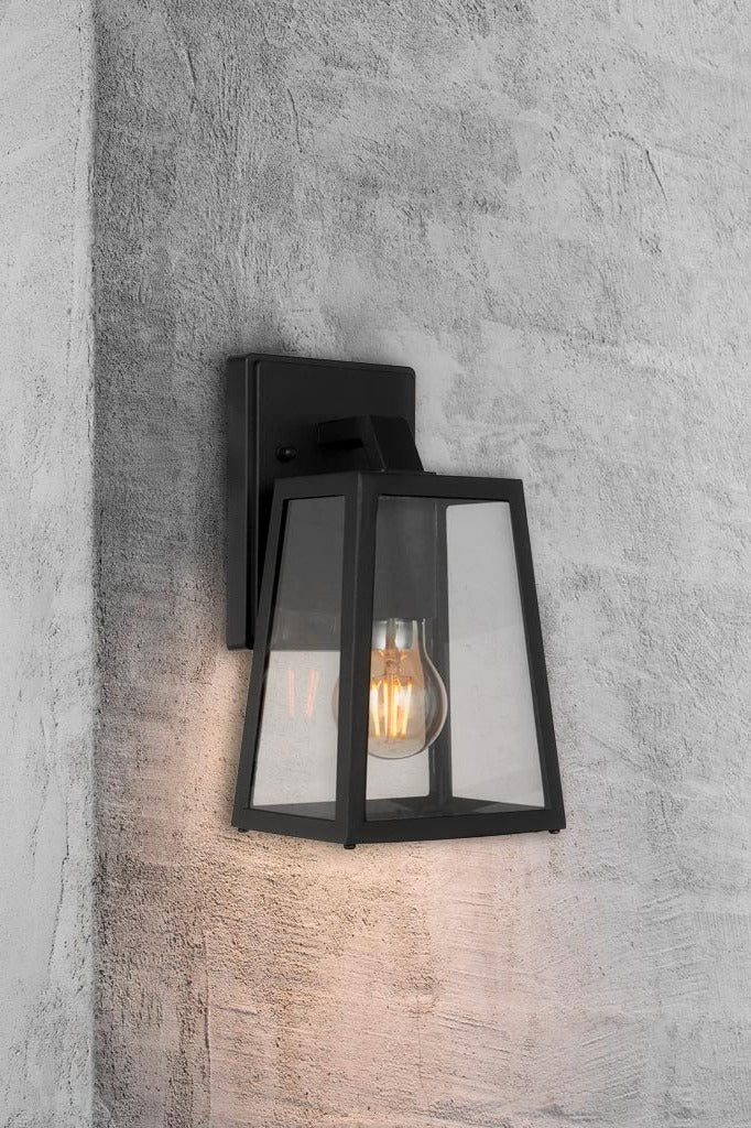 Black small outdoor light brightening exterior areas