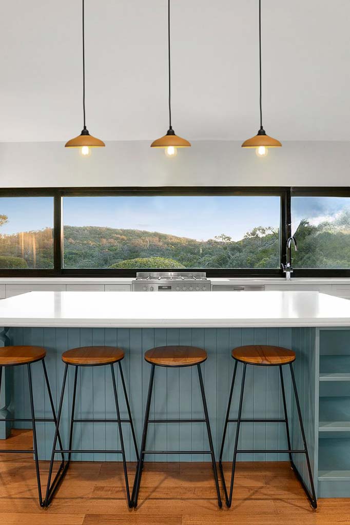 wooden pendants over kitchen island