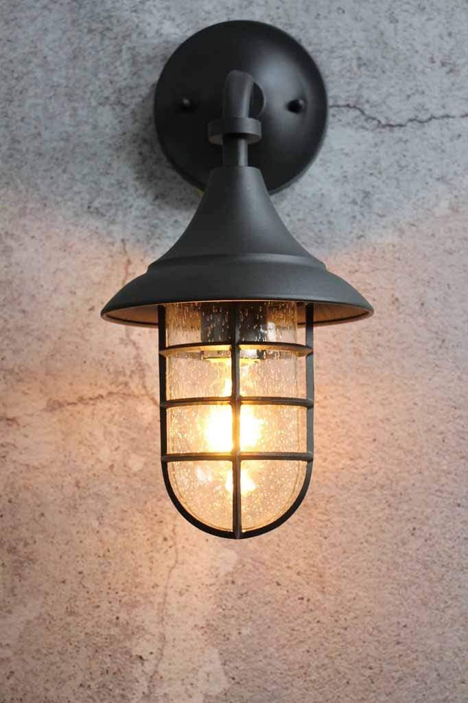 exterior-wall-light-with-cage-shade-and-bubble-glass