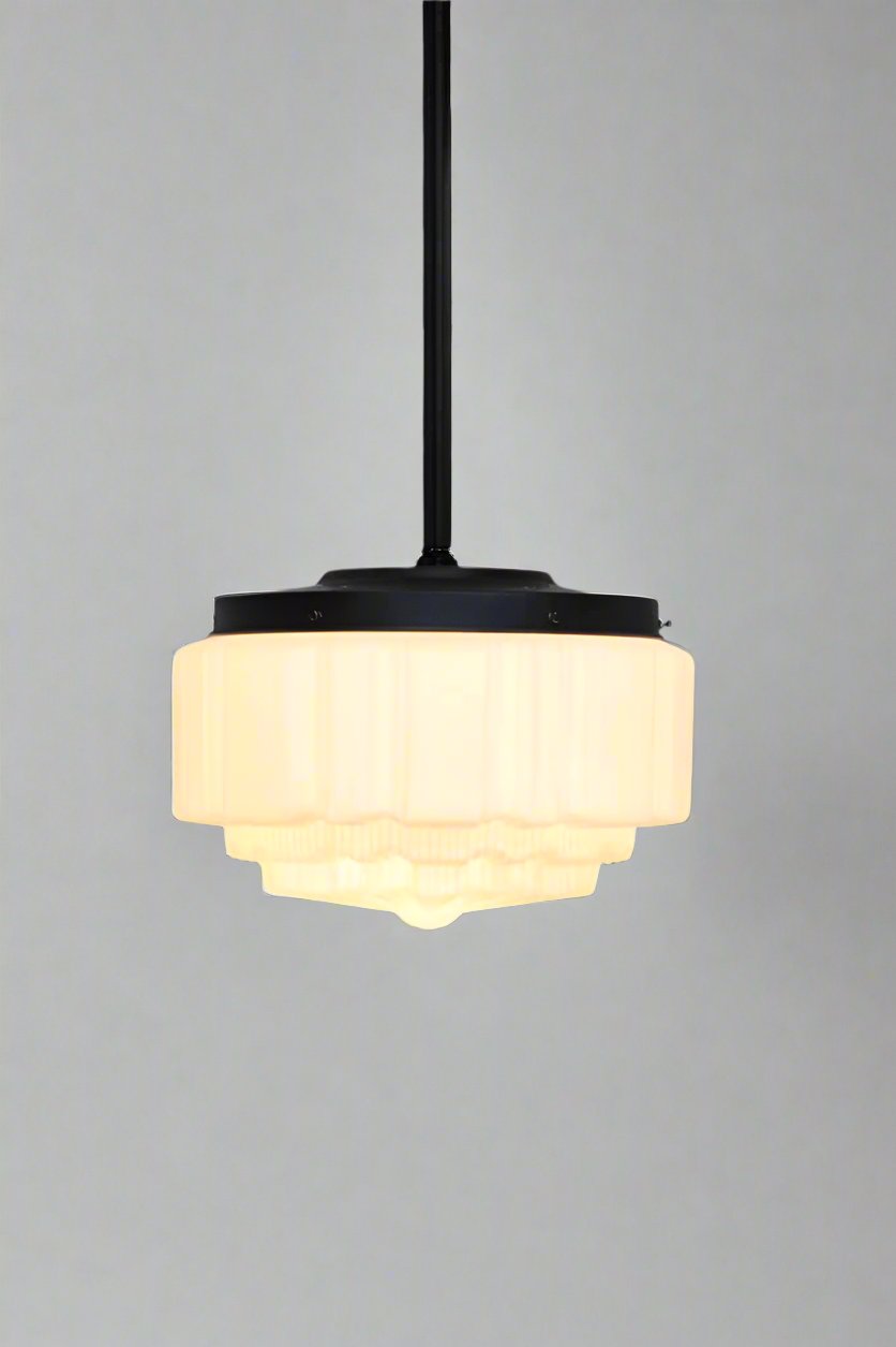 large glass pendant light with pole suspension