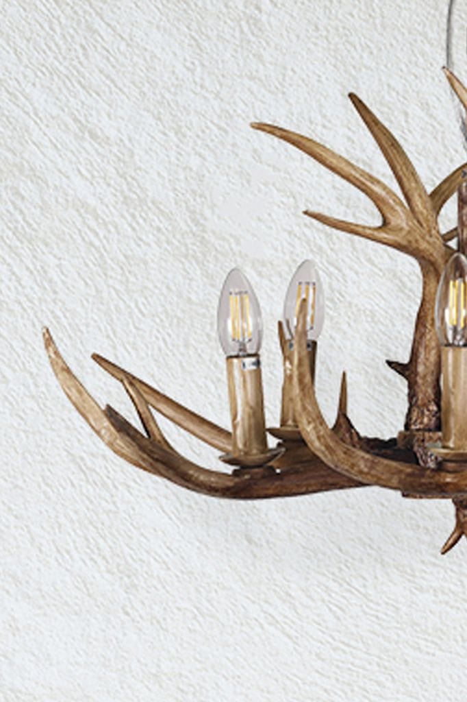 Close-up of detailing on small Roebuck chandelier. 