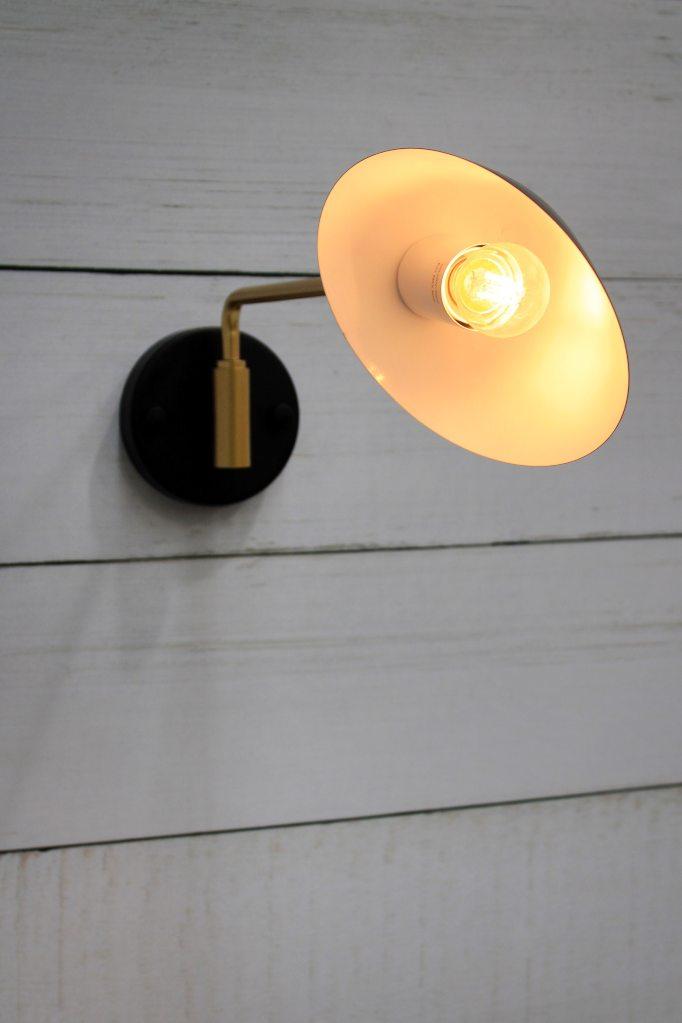 Adjustable steel wall light