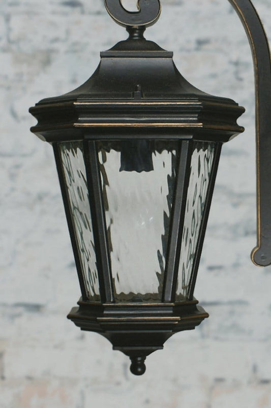 Antique bronze finish with rippled glass panes