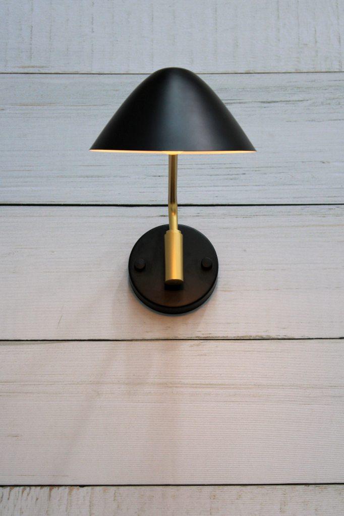 Black and brass wall light