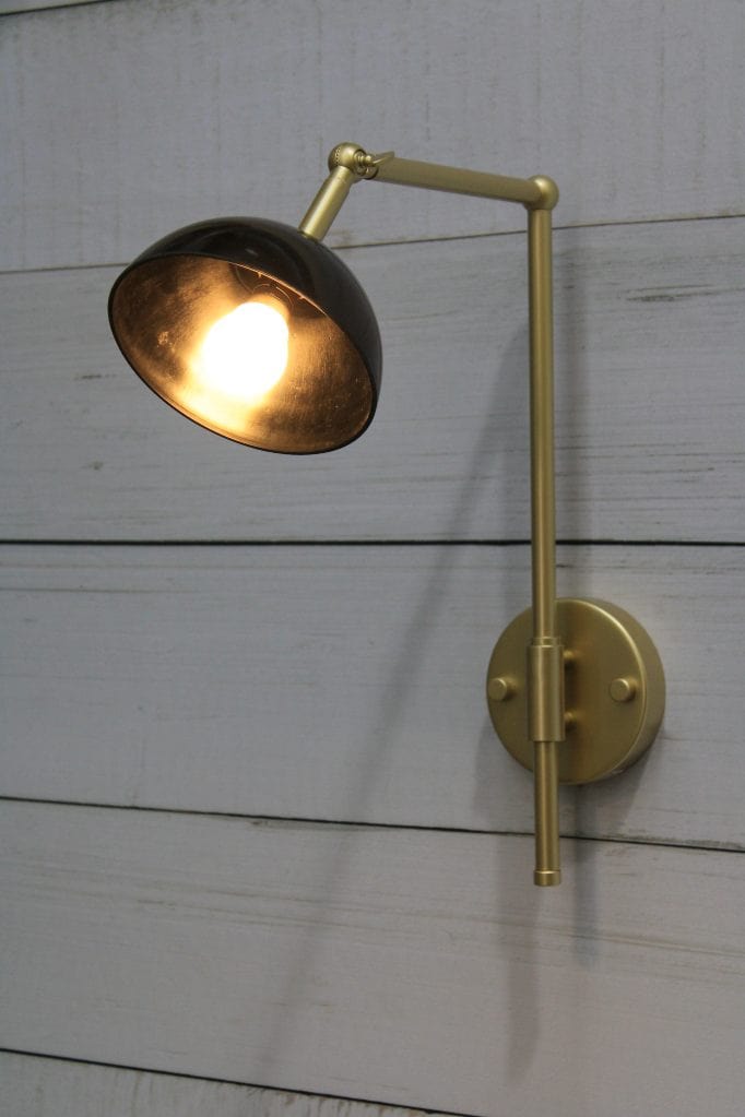 Gold/brass sconce with black shade