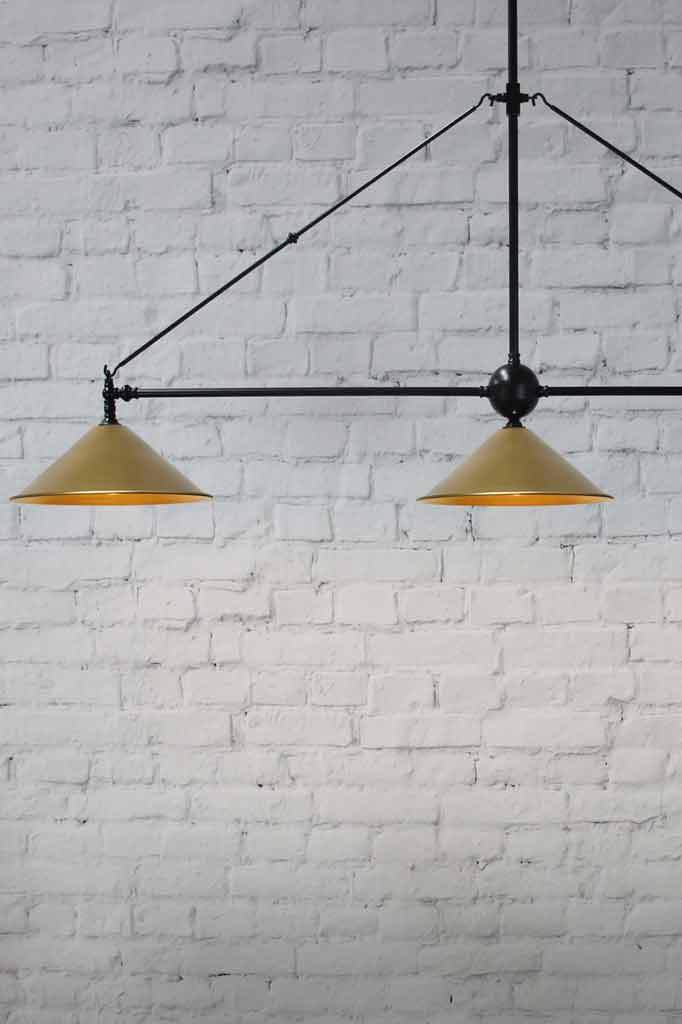 Black-chandelier-bright-brass-shades