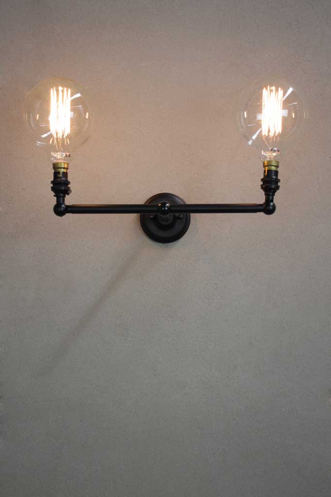 B22 double arm sconce mounted upwards