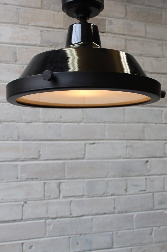 Black flush mount light with flat frosted cover