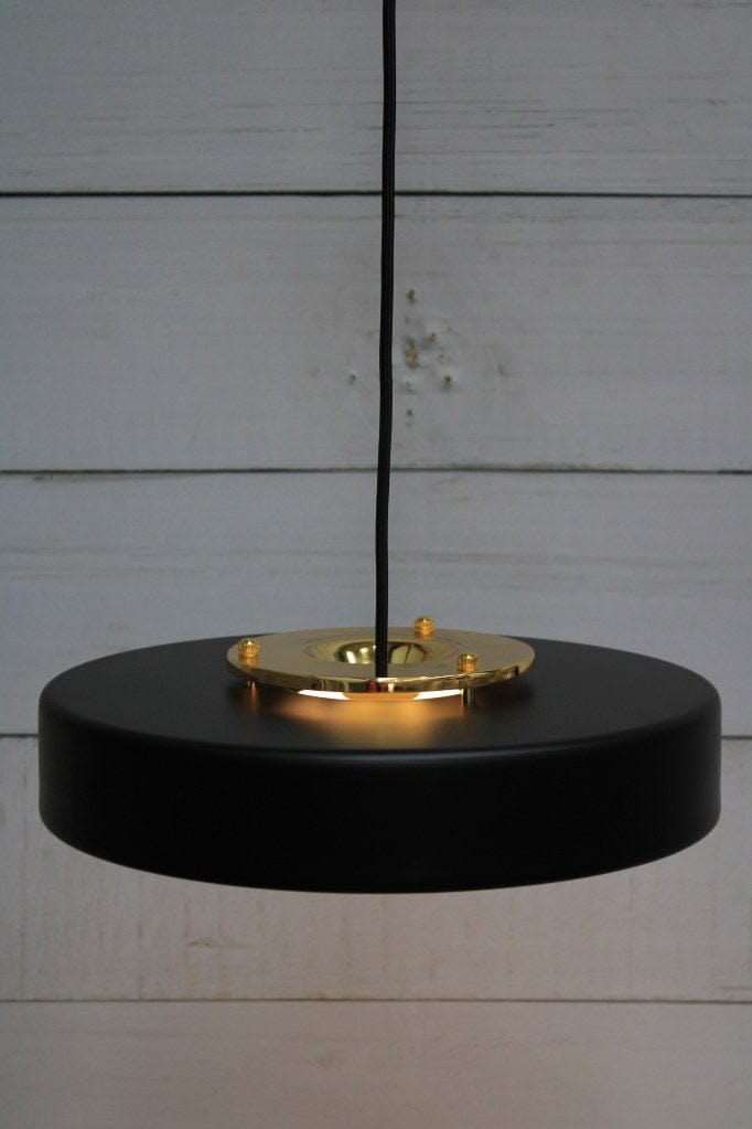 Black finish shade and gold/brass metalware on pendant light