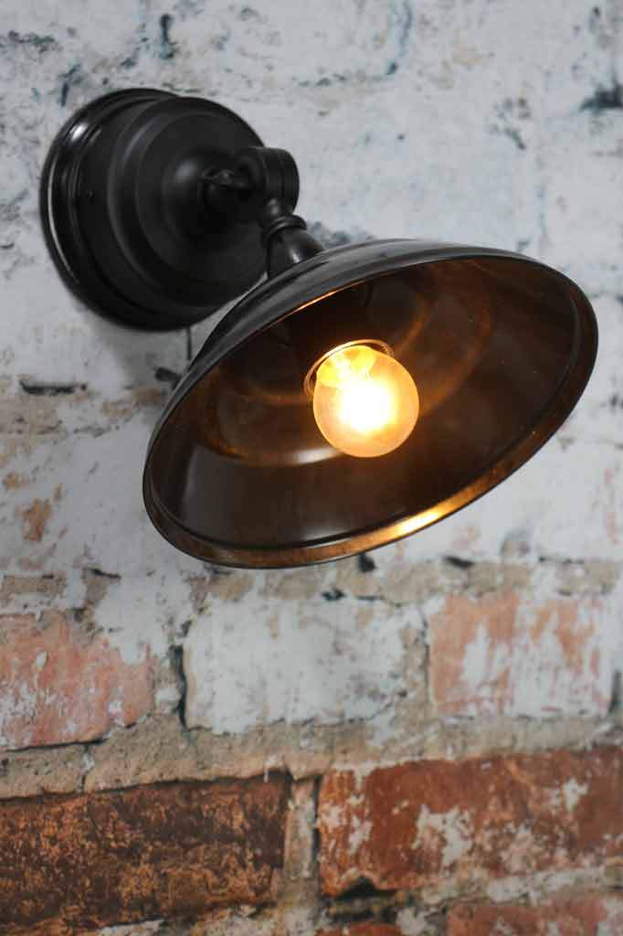 Bakelite Bowl on black wall arm 