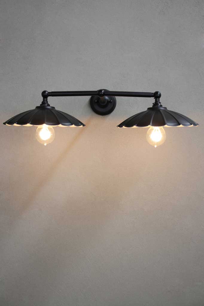 Black steel double arm wall light