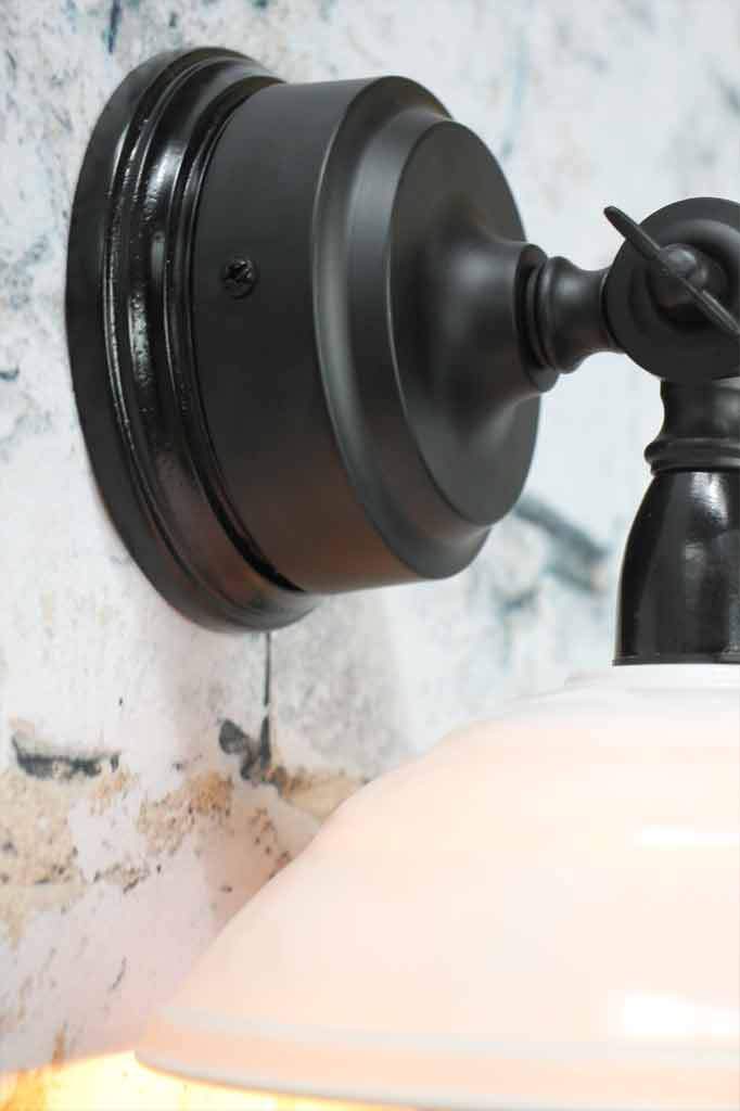 Bakelite Bowl on black wall arm 