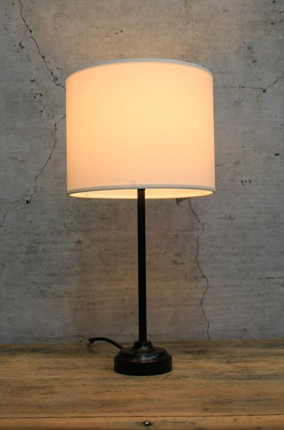 Black table lamp with white fabric shade