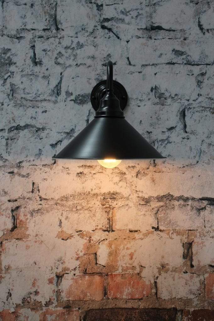 Matt black wall arm with black steel shade