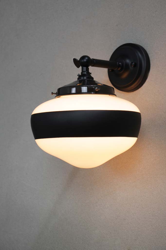 Black wall light with small opal one stripe shade