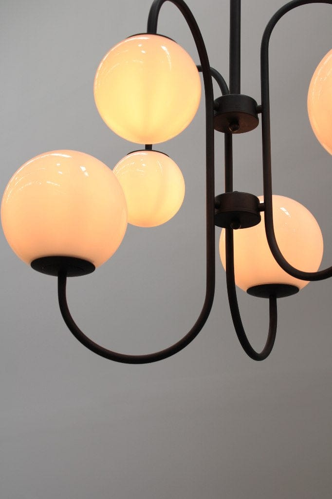 Six light chandelier in a black finish close up