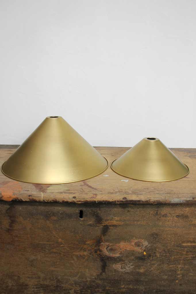 Bright brass shades in two sizes