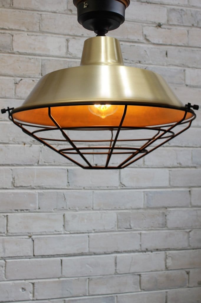 Bright brass flush mount with cage guard