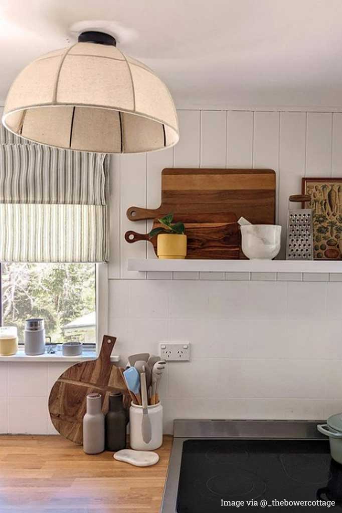 Rustic flush mount light in a kitchen.