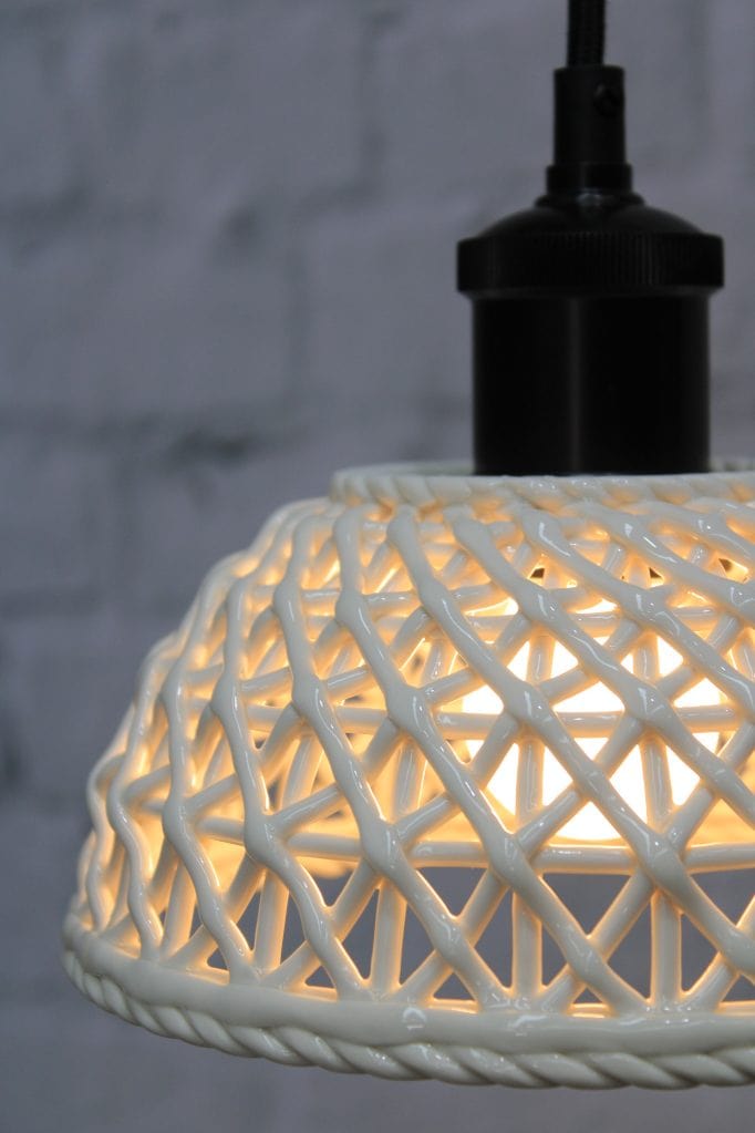 Small ceramic lattice pendant light with black cord