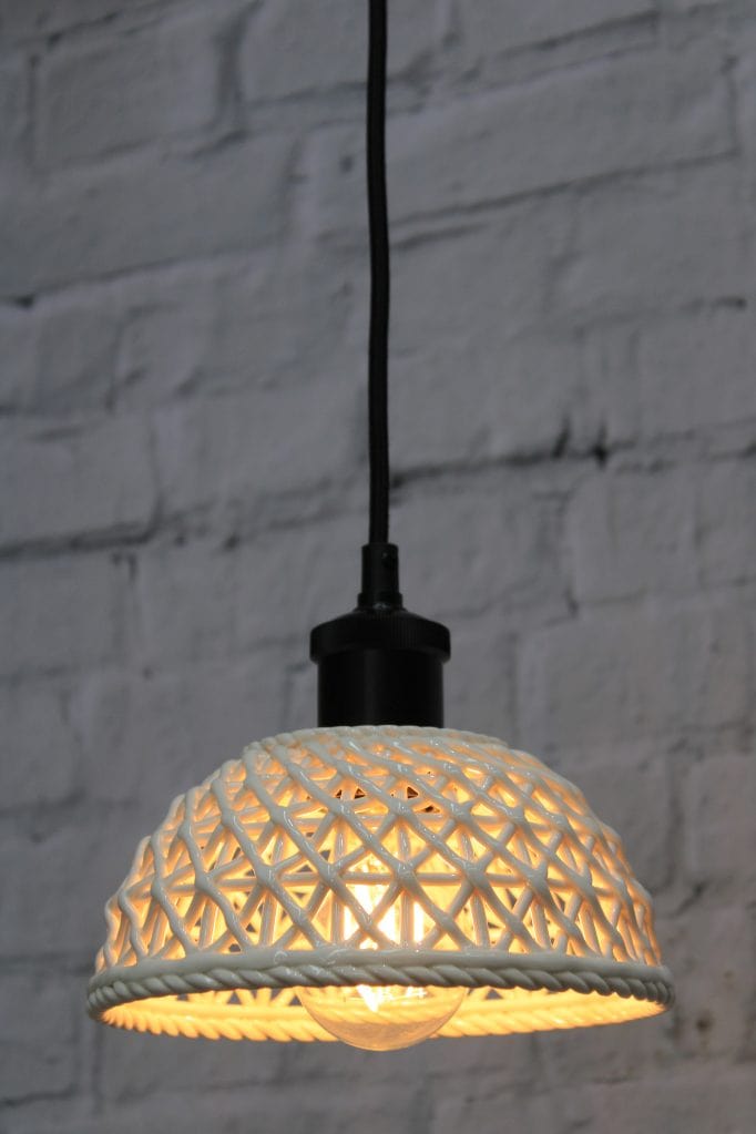 Small ceramic lattice pendant light with black cord