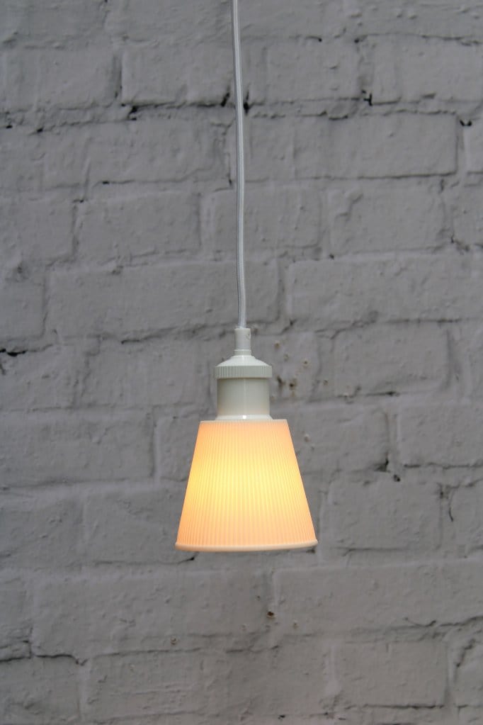 Small ceramic pendant light with white cord