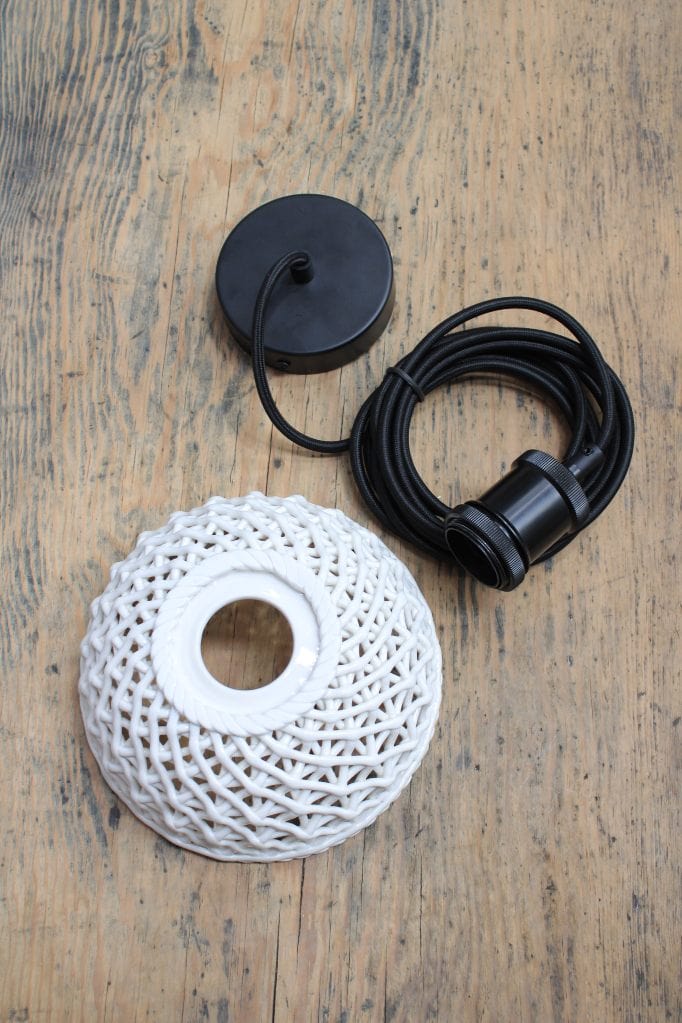 Small ceramic lattice pendant light with black cord