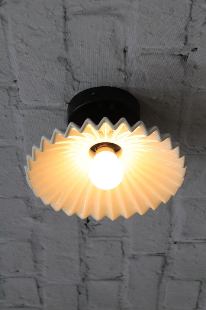 Flush mount ceiling light with glazed white ceramic shade