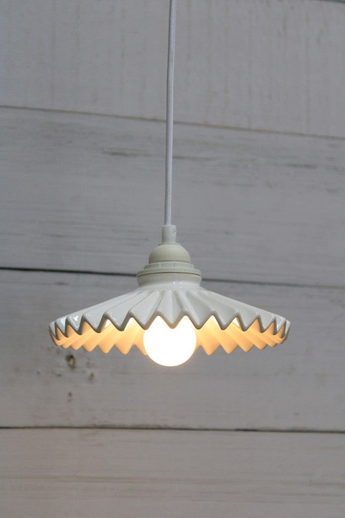 White pendant cord with white ceramic shade