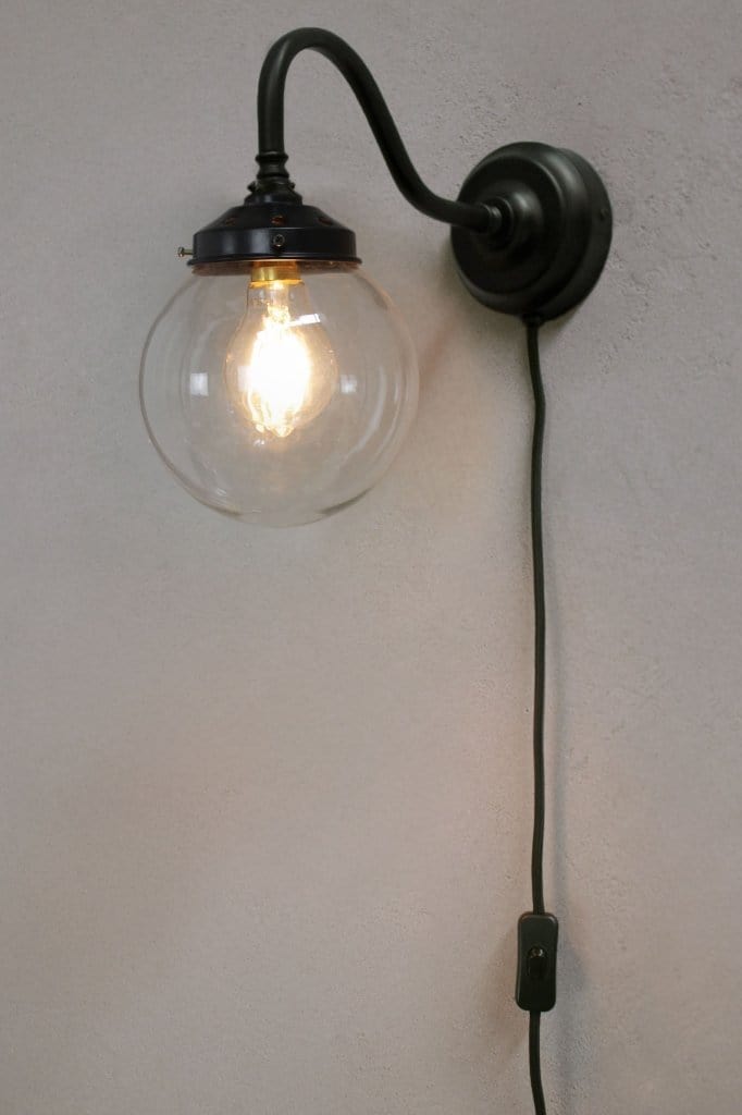 Clear small wall light with wall plug