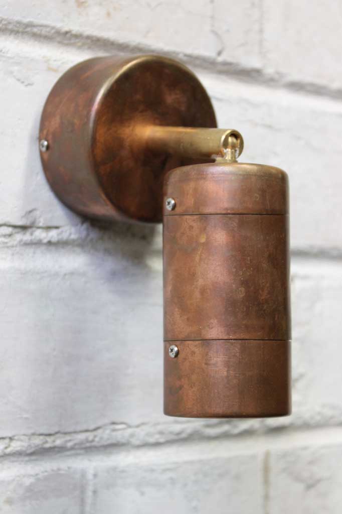 Copper wall light facing downwards. 