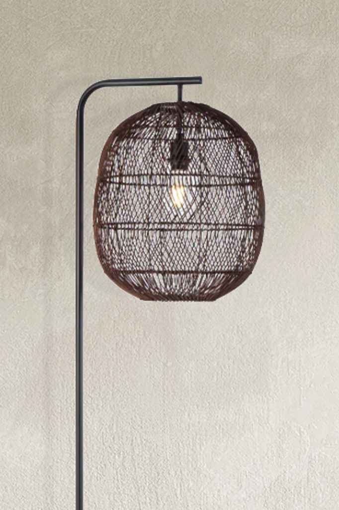 Close-up of rattan shade in brown. 