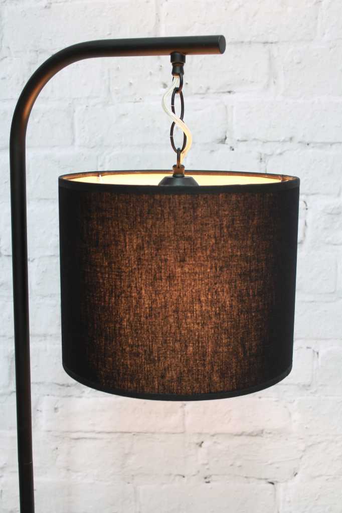 Black floor lamp with black fabric shade