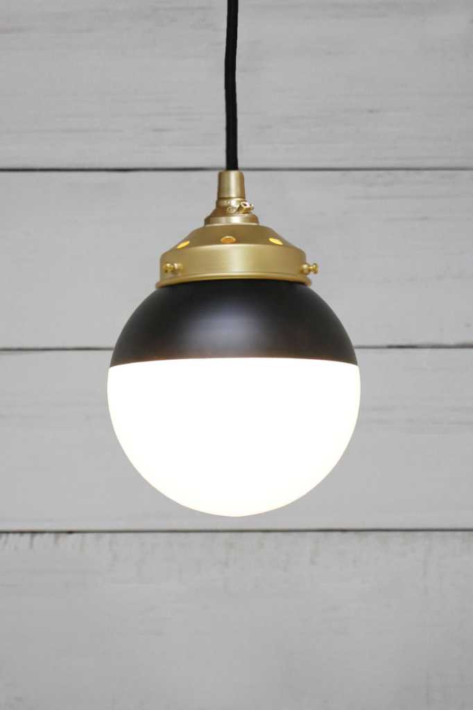 Black and gold store round pendant light