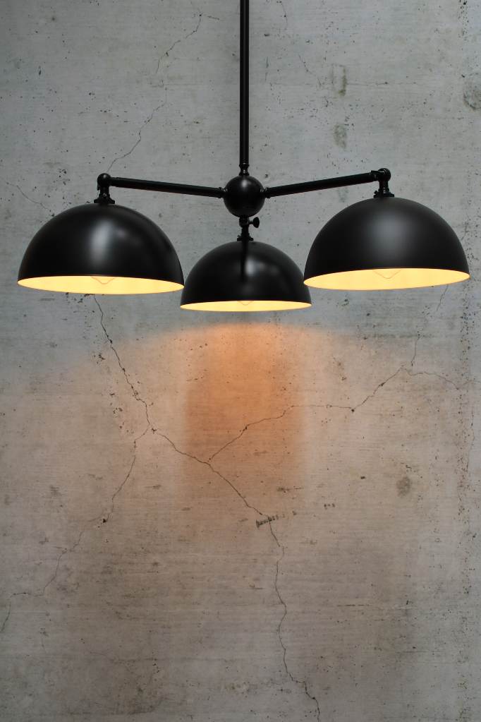 Black steel chandelier with small dome shades