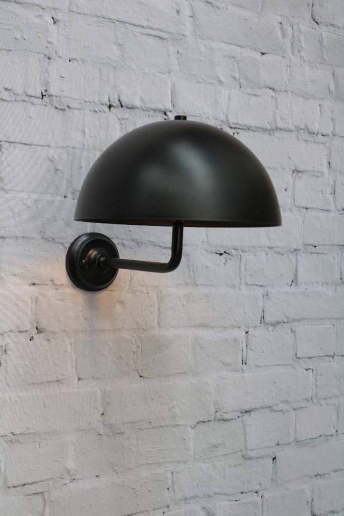 Black wall sconce with black shade