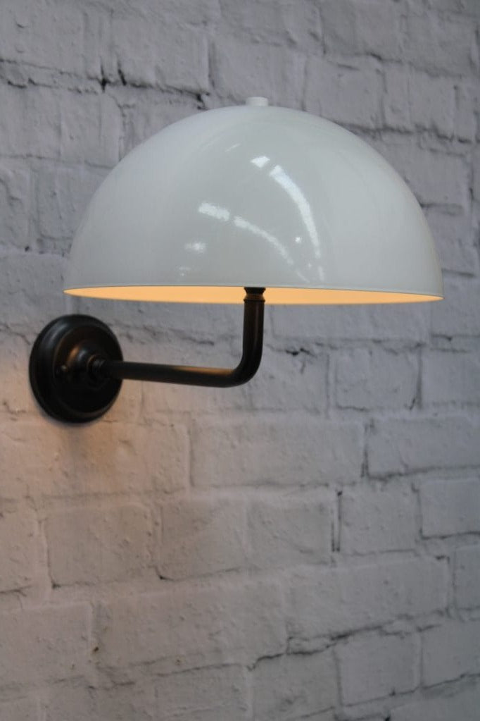 Black wall sconce with white shade