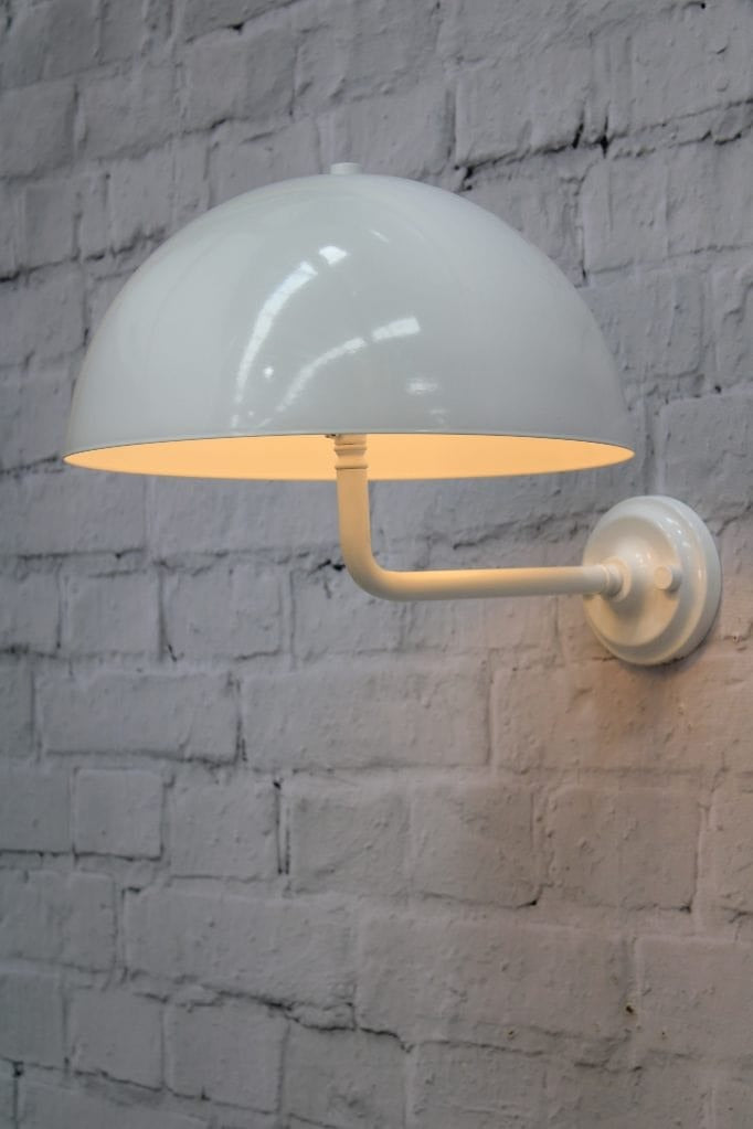 White wall sconce with white shade