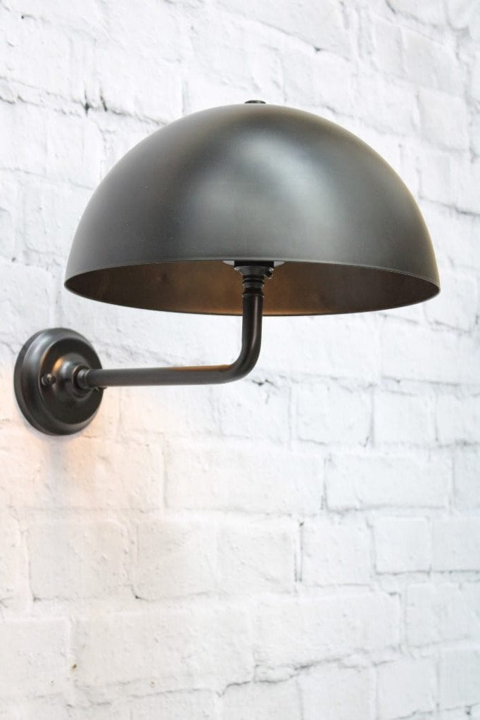 Black wall sconce with black shade