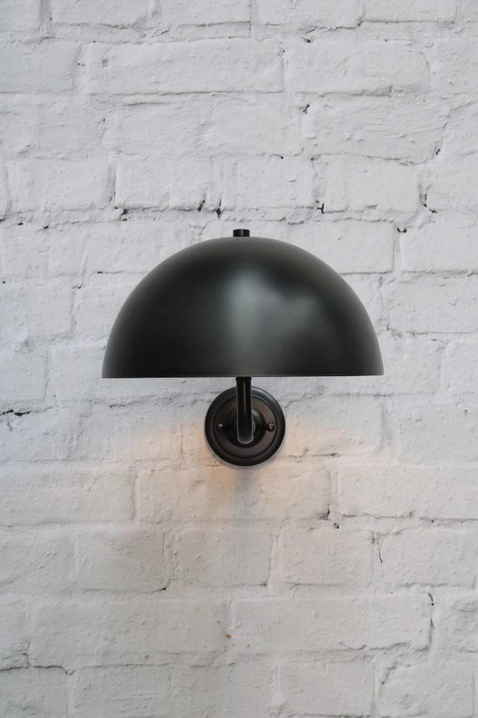 Black wall sconce with black shade