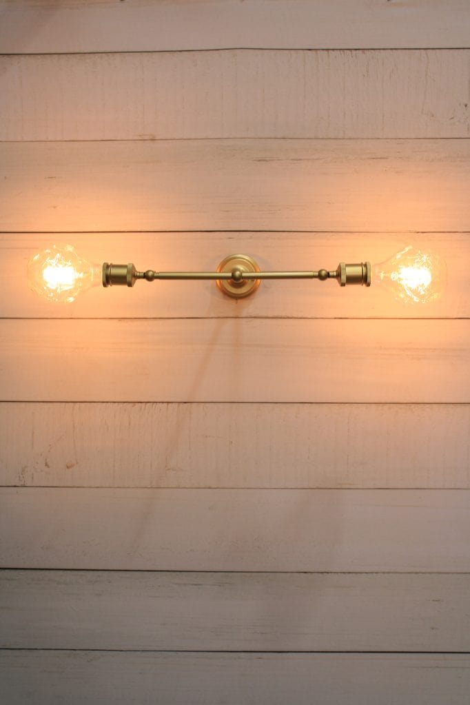 Double Arm Sconce in gold, horizontal position