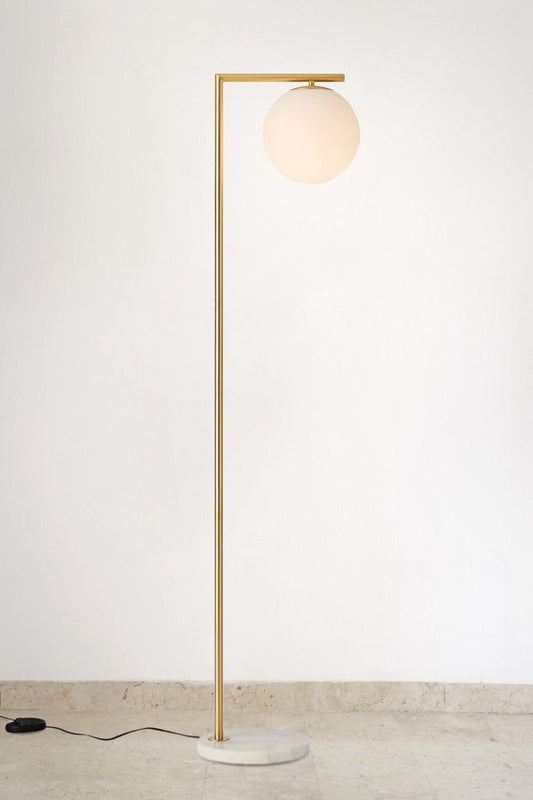 Mid-century modern floor lamp with gold/brass stem and real marble base