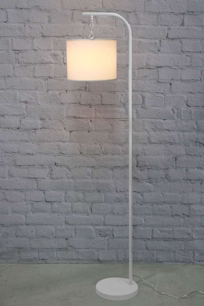 White floor lamp with white fabric shade