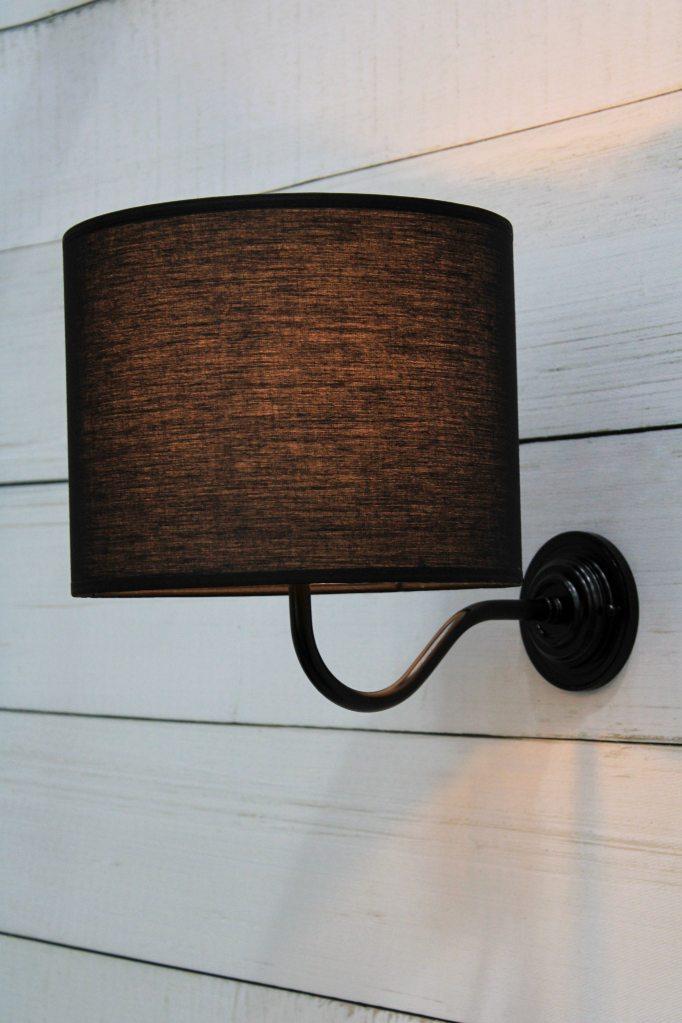 Fabric wall light mounted upright